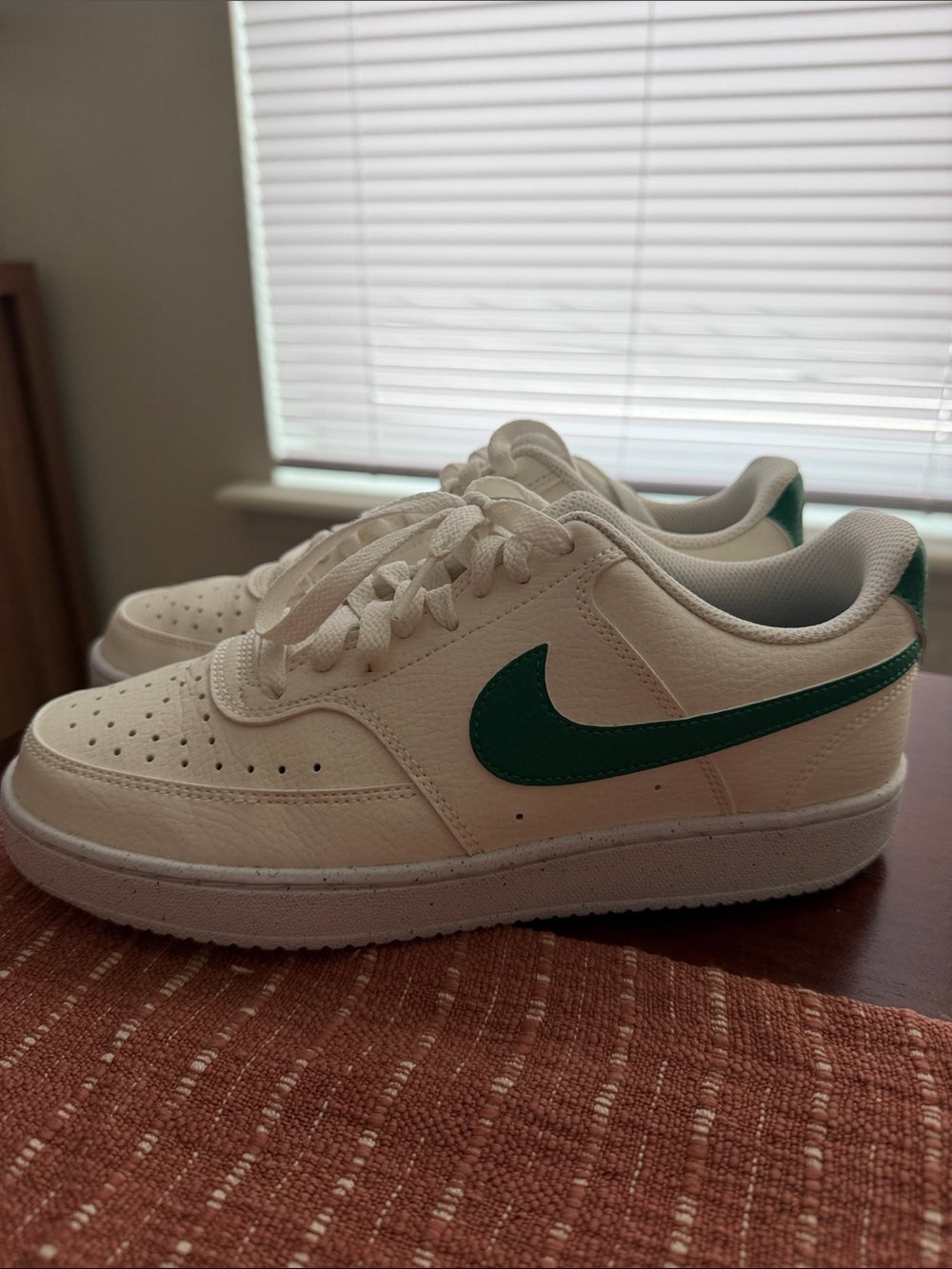 Nike Women’s Cream Low-Top Sneakers with Green Swoosh